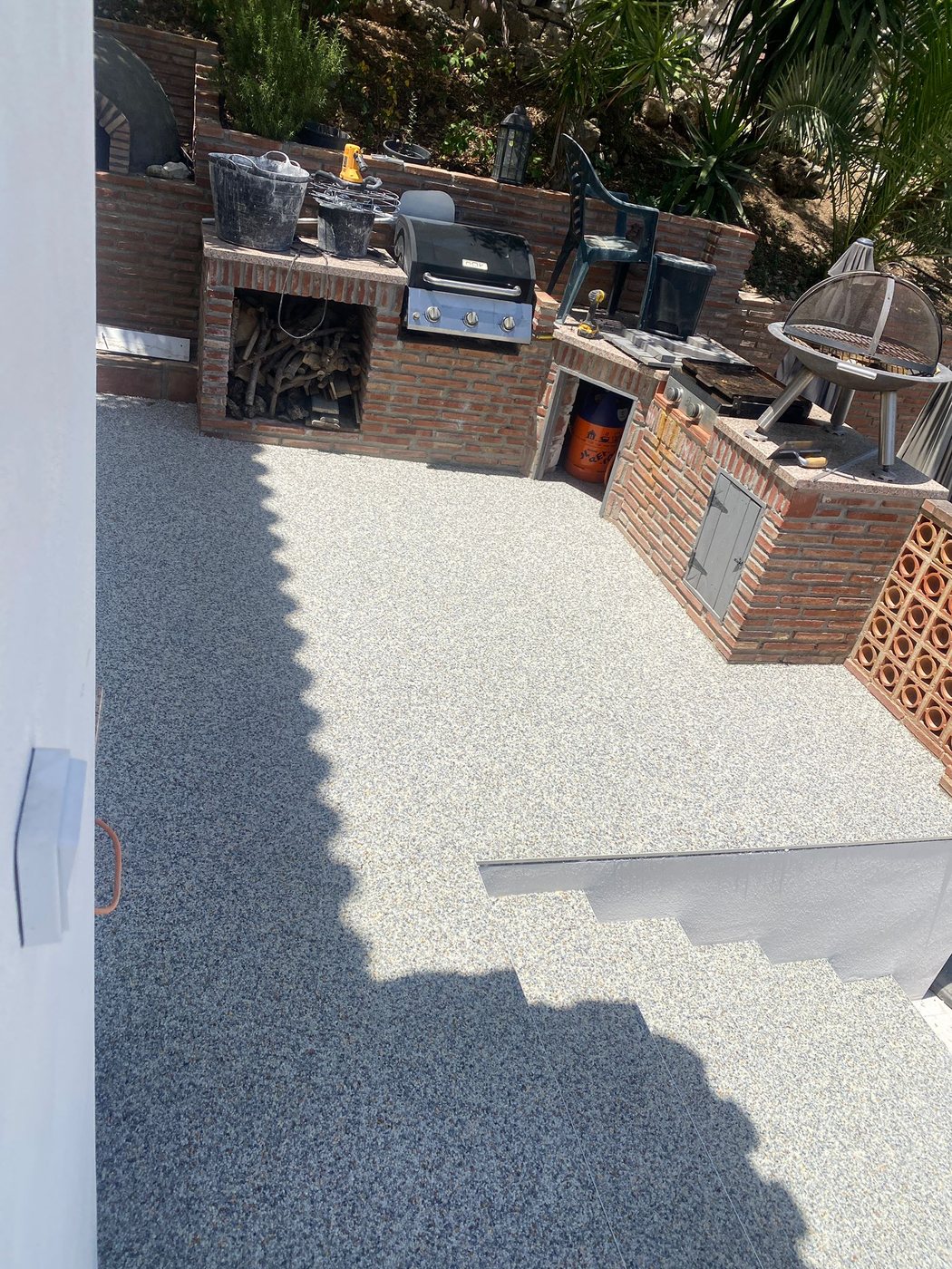 Zona de cocina exterior drenante